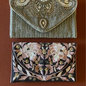 Two beaded like new clutches